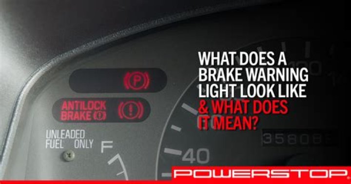 What should a driver do if the brake indicator light lights up?